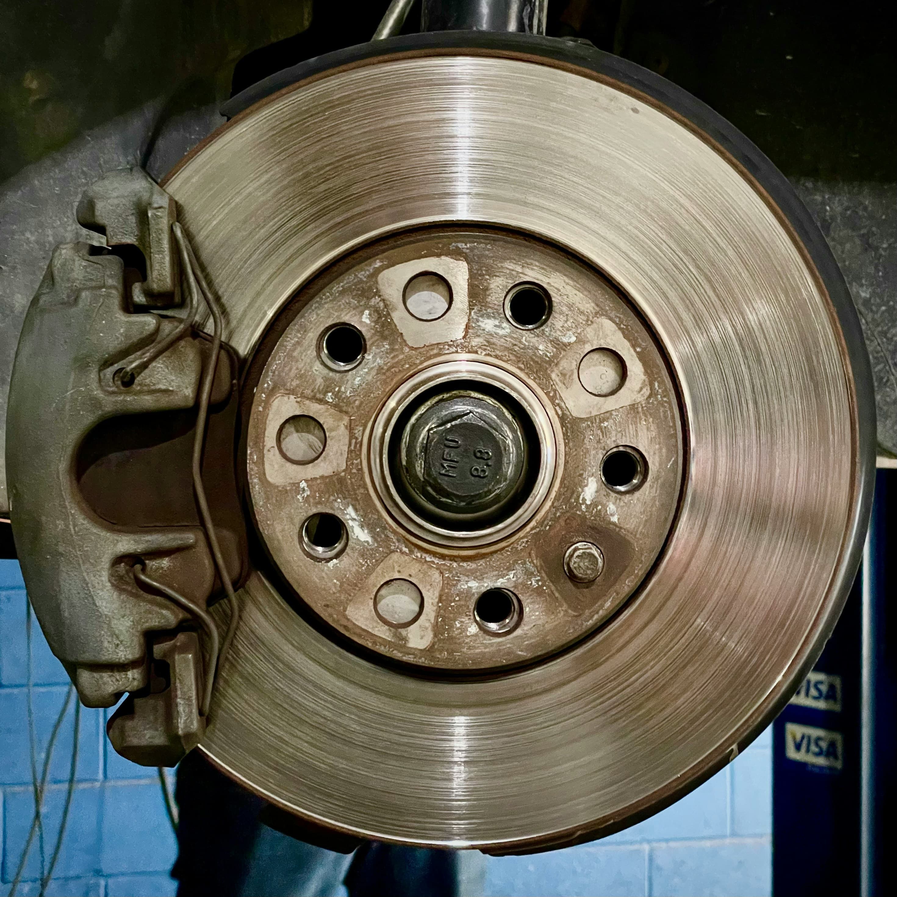 Worn and rusted brake rotors on old vehicle