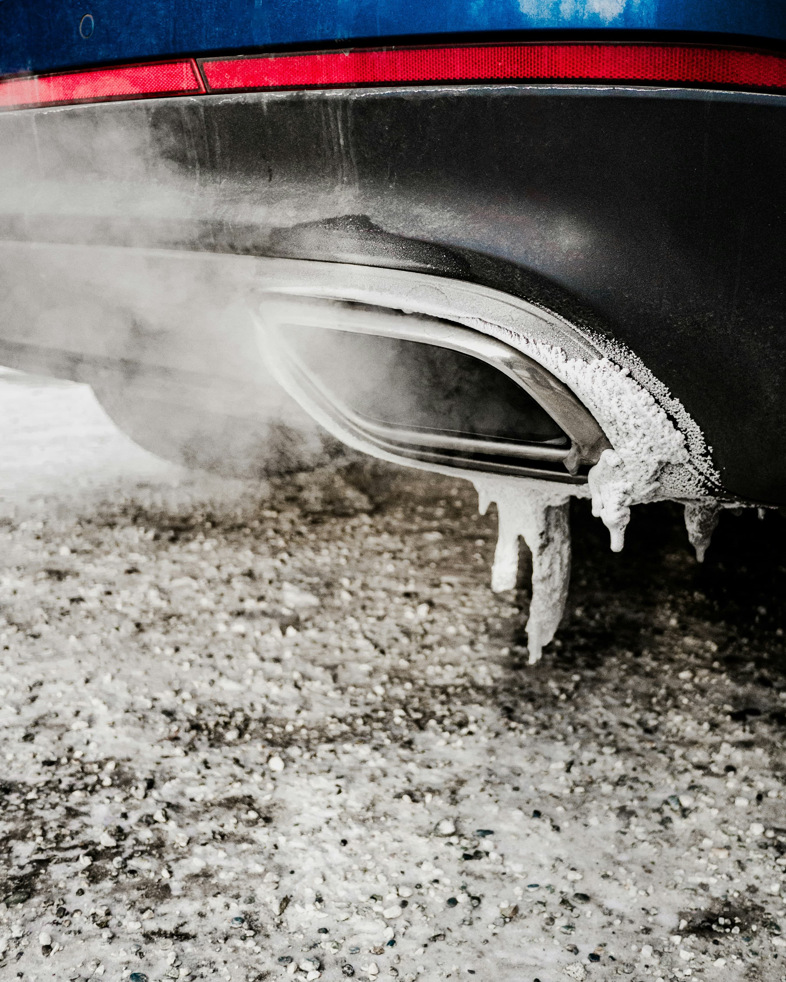 Rusted and leaking exhaust pipe with holes